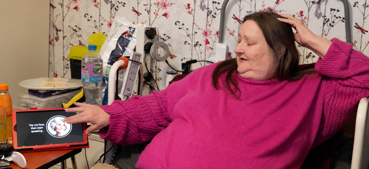 Yvonne speaking with Rosie, one of the digital companions, in the Altered Britain documentary